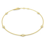 Round brilliant cut diamond spectacle bracelet in 18kt yellow gold with delicate chain and sparkling stones