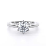 Audrey Round engagement ring with round brilliant cut diamond and six claw setting on polished metal band