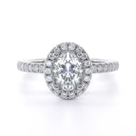 Sophia Oval engagement ring with oval cut diamond and micro set diamond halo on white gold band
