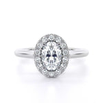 Jennifer Oval engagement ring with oval cut diamond center and halo setting