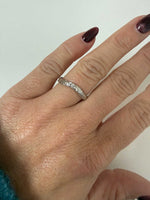 The Bloom Band delicate hand-engraved floral jewellery band with daisy and rose motifs in 9kt, 18kt, and platinum options