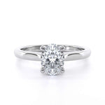 Delilah Oval engagement ring with oval cut diamond and diamond set gallery in a sleek band
