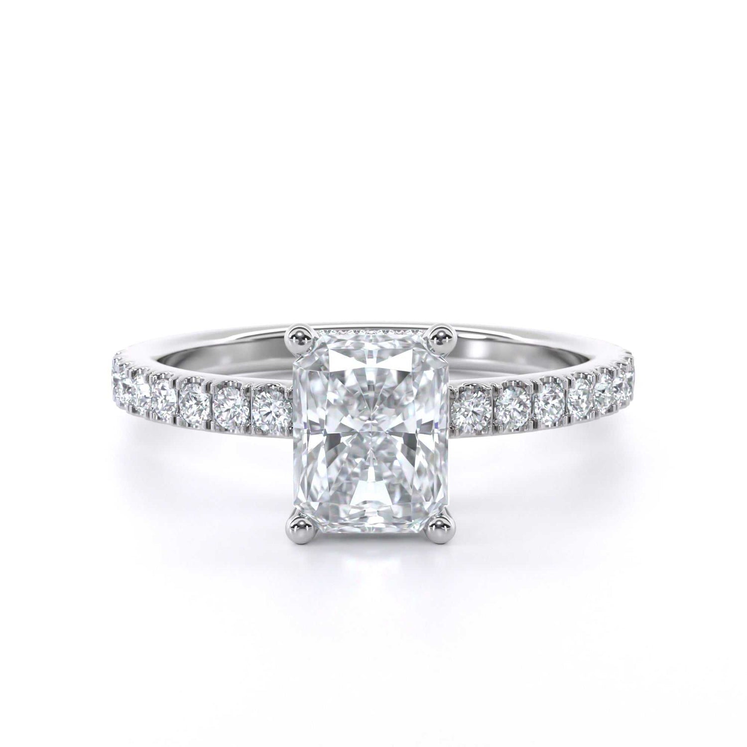 Piper Radiant ring with radiant cut diamond center and micro set diamond halo on delicate shoulders