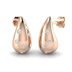 Chunky teardrop diamond stud earrings in 18kt rose gold with round brilliant cut diamonds flush set