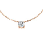 Round brilliant cut diamond solitaire pendant on rose gold chain