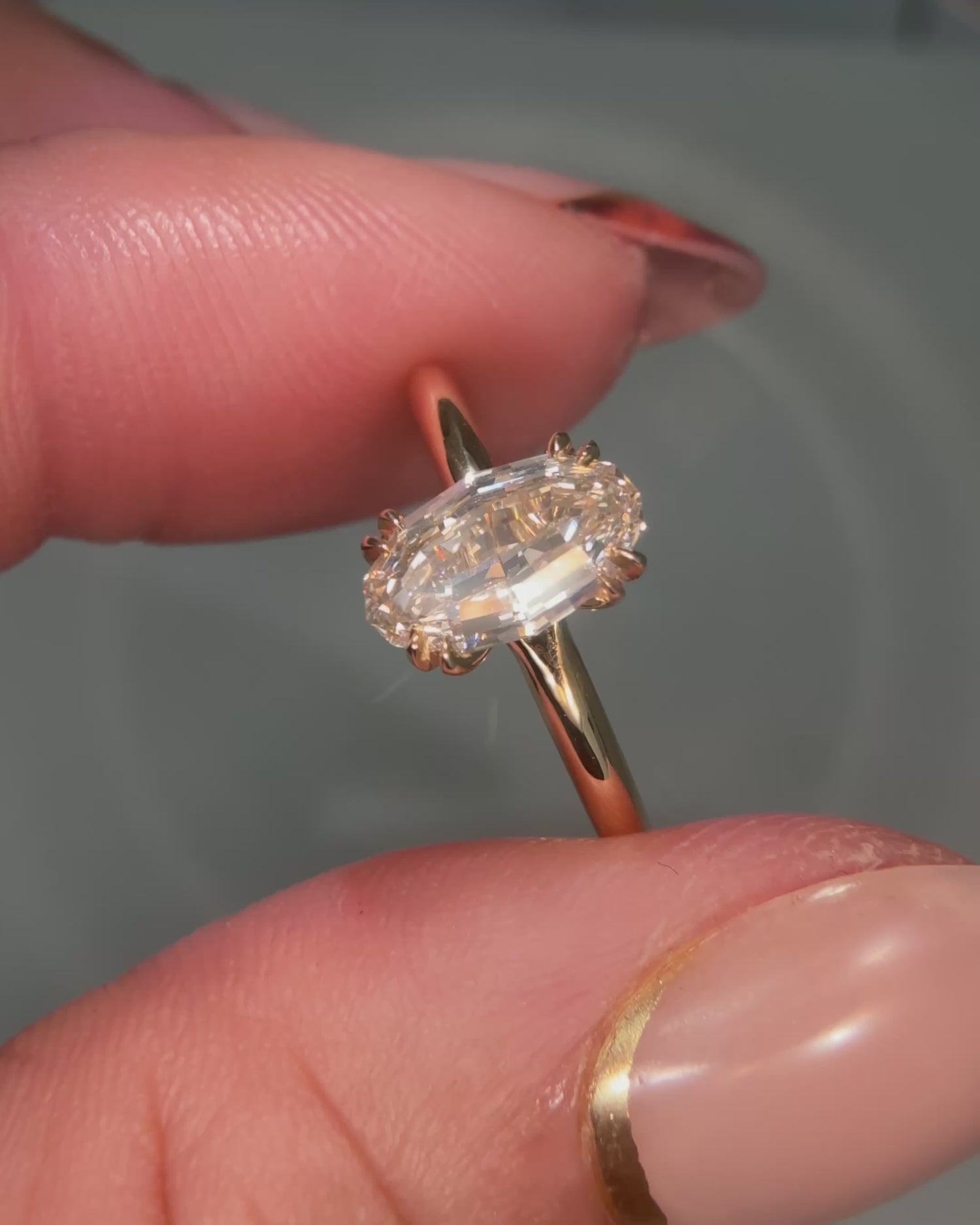 Oval Step Cut Diamond Solitaire Ring