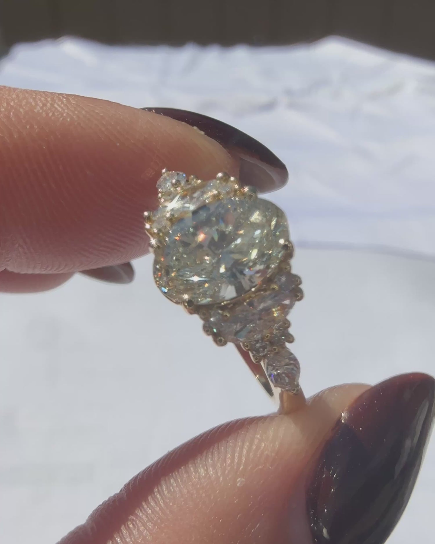 Oval Cut Diamond Esmeralda Ring
