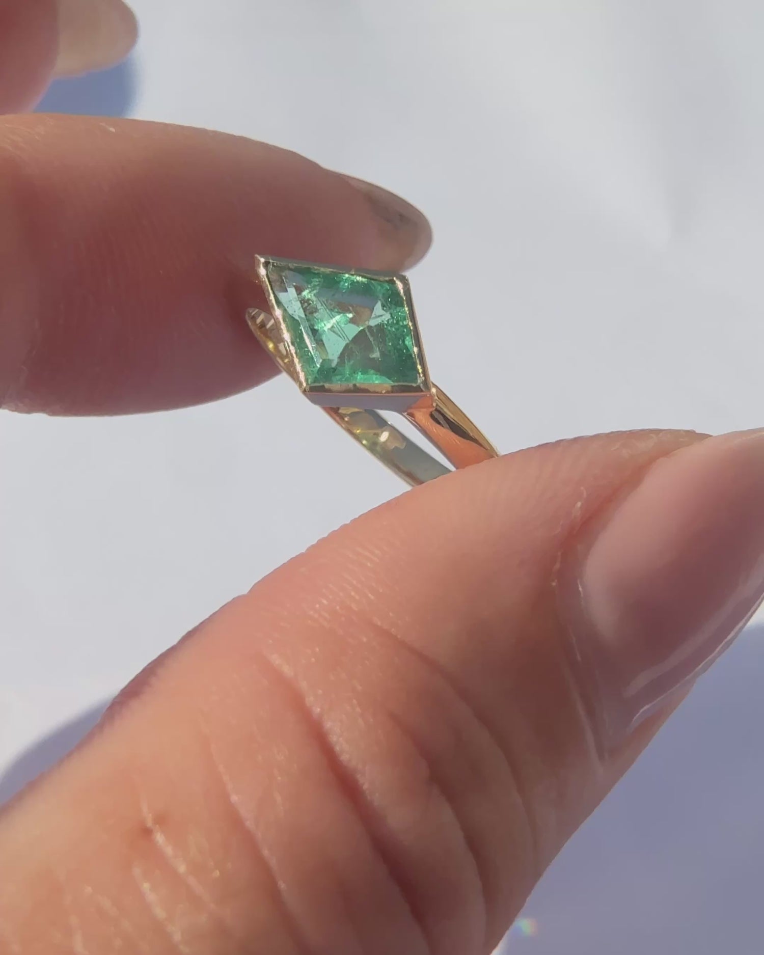 Kite Shape Bezel Emerald Ring