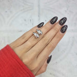 Chunky teardrop diamond stud earrings in 18kt gold with round brilliant diamonds, modern elegant design