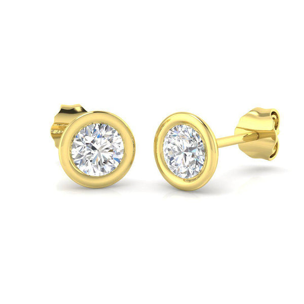 Round brilliant cut diamond bezel stud earrings in 18kt yellow gold