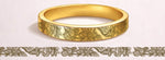 The Bloom Band delicate hand-engraved daisy and rose floral wedding rings in 9kt, 18kt, and platinum