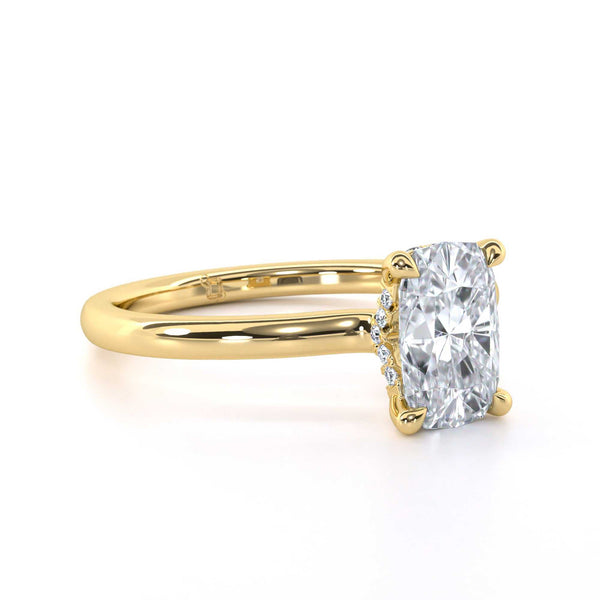Collette Cushion engagement ring with elongated cushion cut diamond and gold collet setting