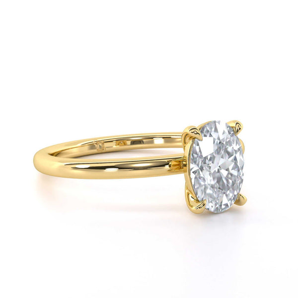 Maria Oval engagement ring with oval cut diamond in classic yellow gold solitaire setting