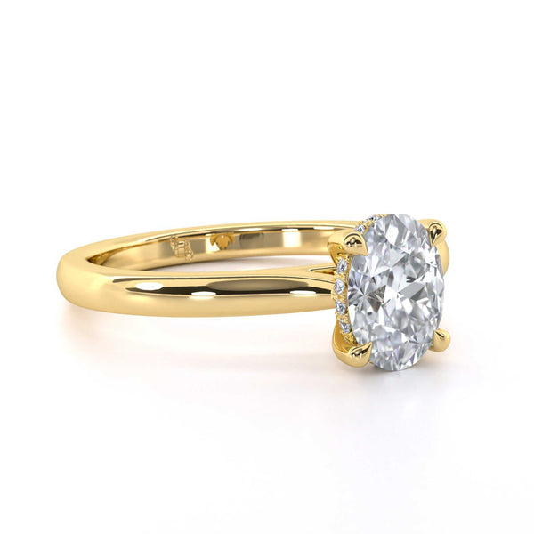 Delilah Oval gold engagement ring with oval cut diamond and diamond set gallery