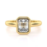 Emerald cut bezel set diamond engagement ring