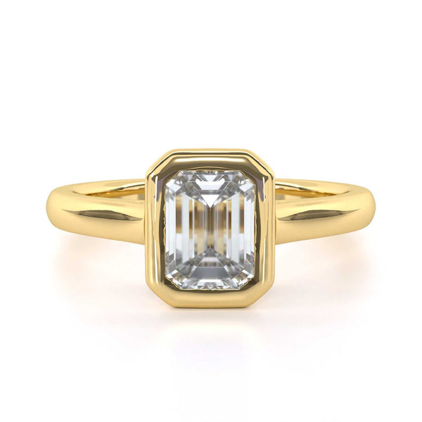 Emerald cut bezel set diamond engagement ring
