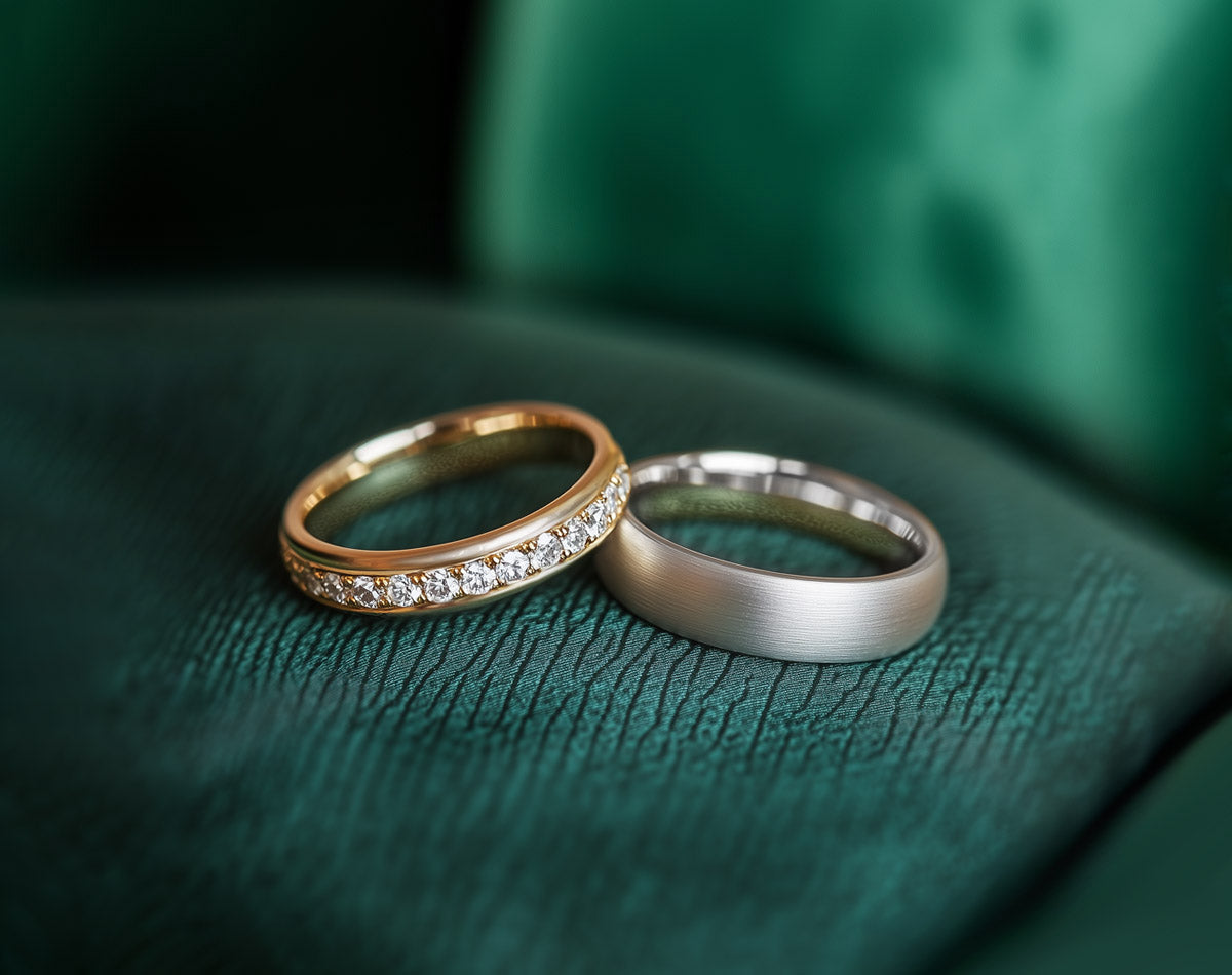 Diamond wedding rings by Clarity Diamonds by Aimee on green leather background