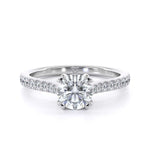 Round brilliant diamond shoulder engagement ring