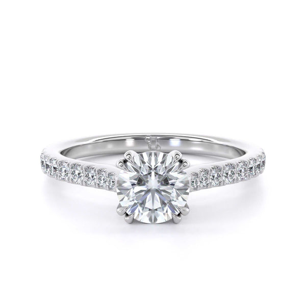 Round brilliant diamond shoulder engagement ring
