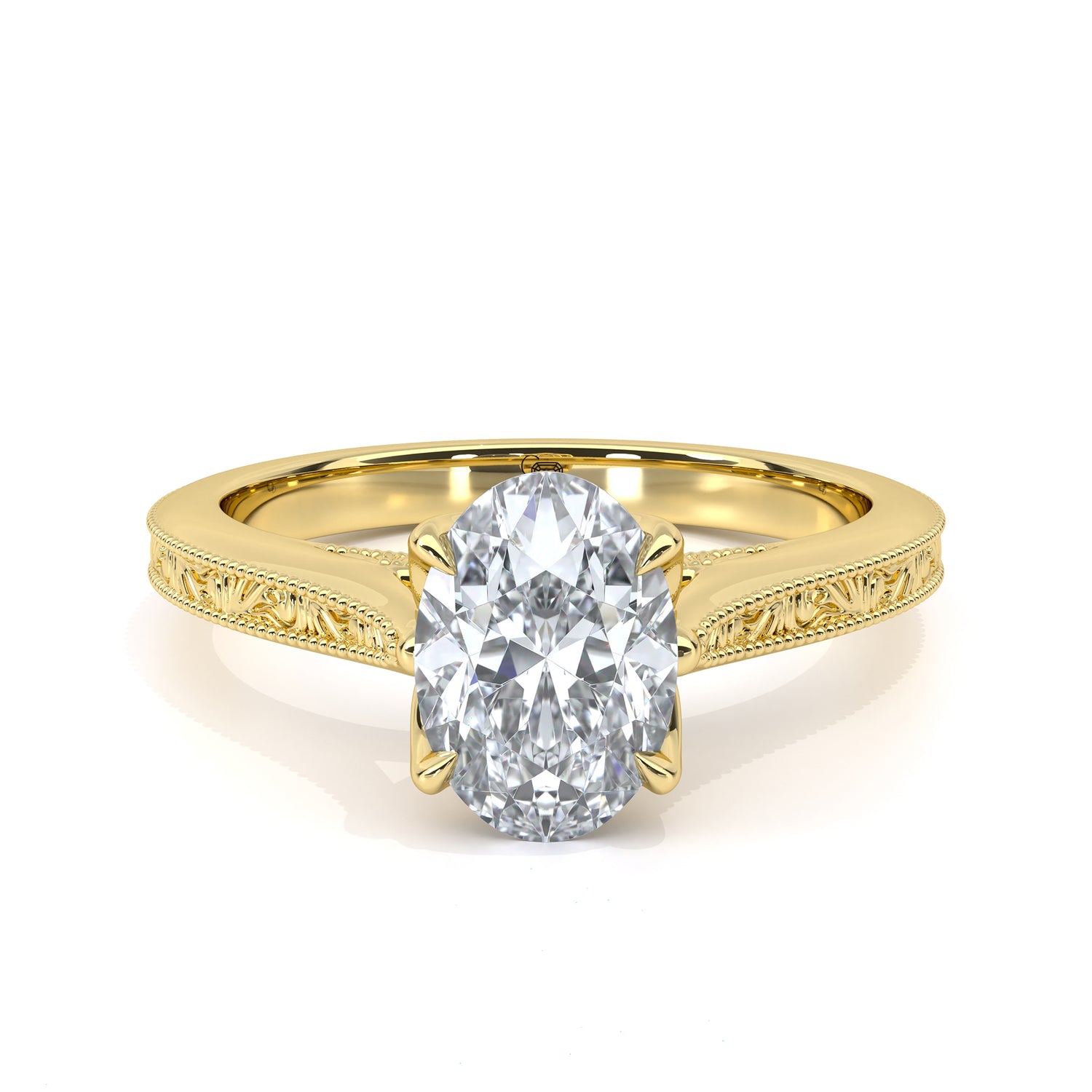 Engraved oval diamond engagement ring