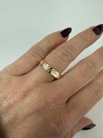 Floral engraved rose diamond band
