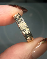 Floral engraved rose diamond band