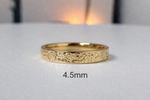 Floral engraved rose diamond band