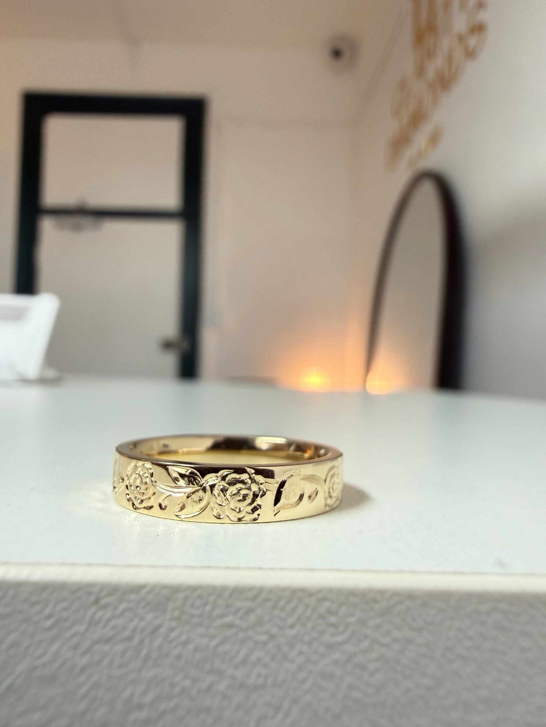 Floral engraved wedding band