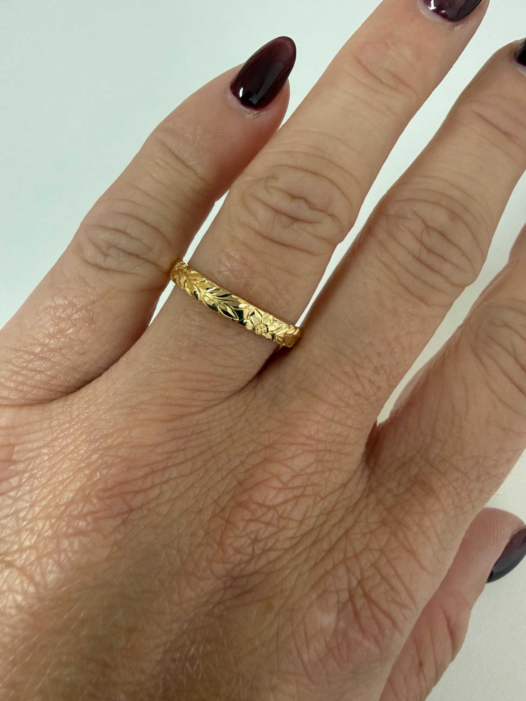 Floral engraved wedding band