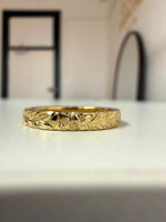 Floral engraved wedding band