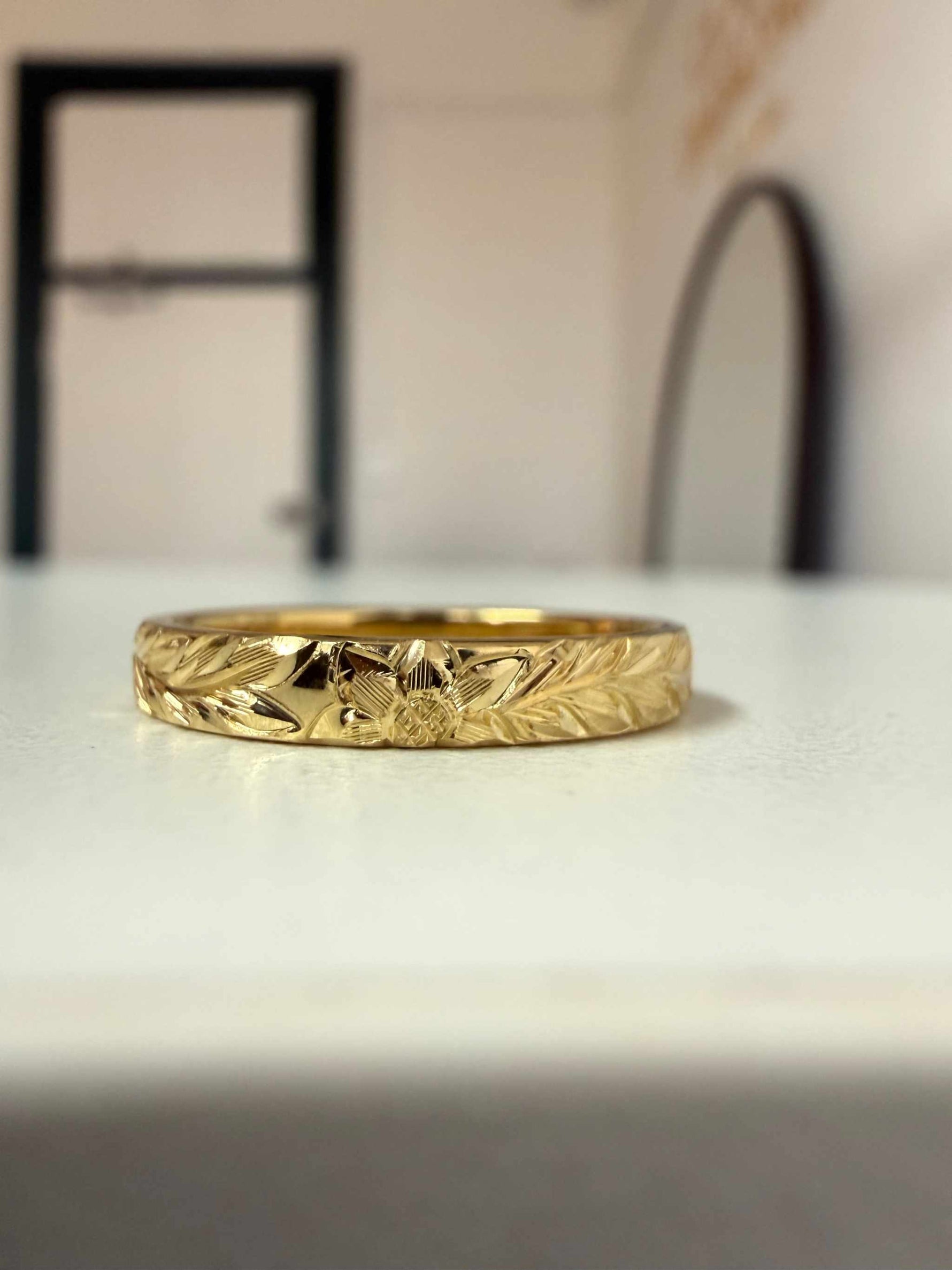 Floral engraved wedding band