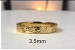 Floral engraved wedding band