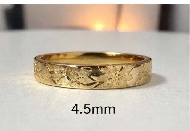 Floral engraved wedding band