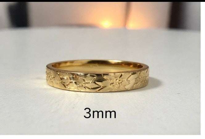 Floral engraved wedding band