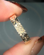 Floral engraved wedding band