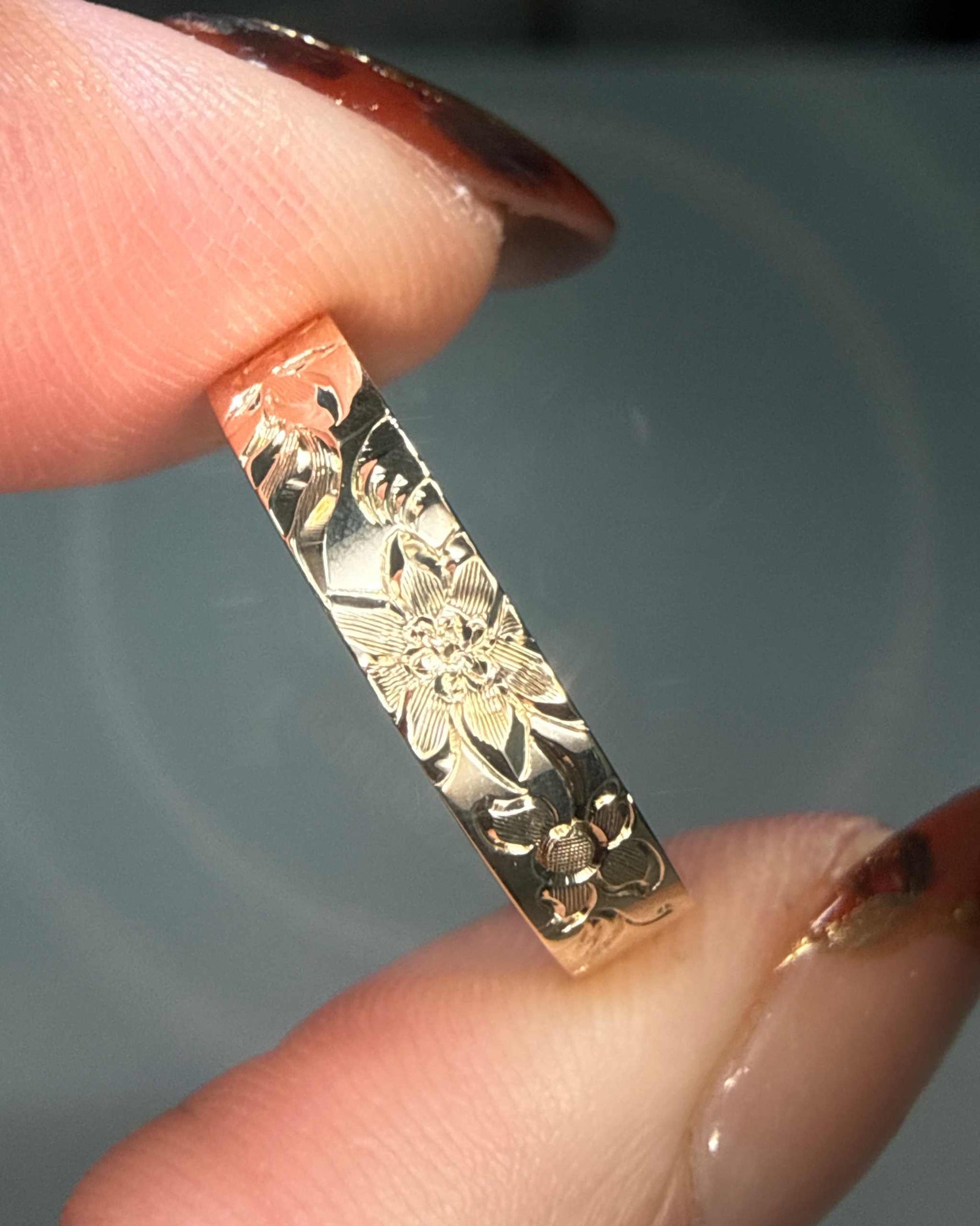 Floral engraved wedding band
