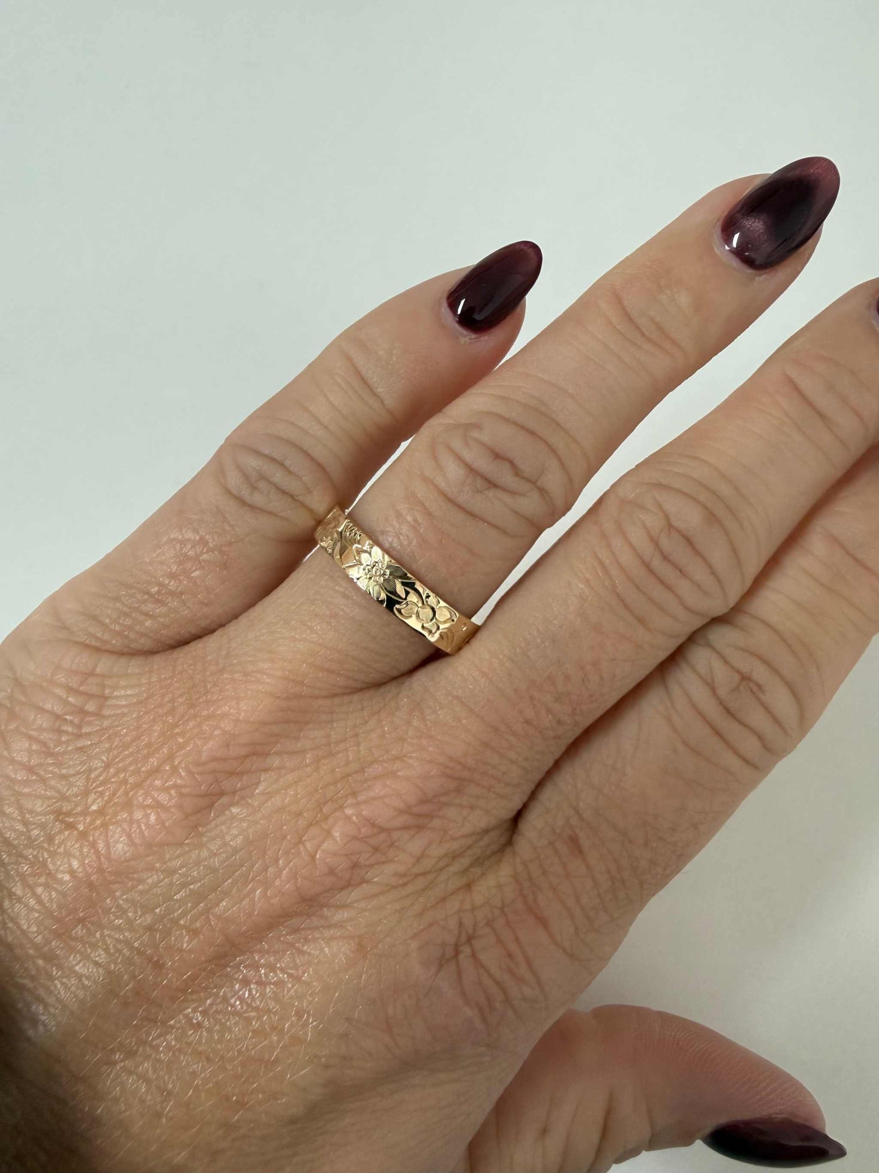 Floral engraved wedding band
