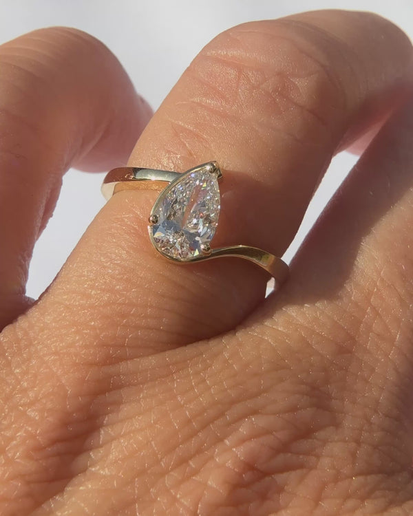 Pearshape Diamond Twist Solitaire Ring