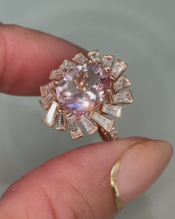 Oval cut morganite and baguette diamond cluster ring