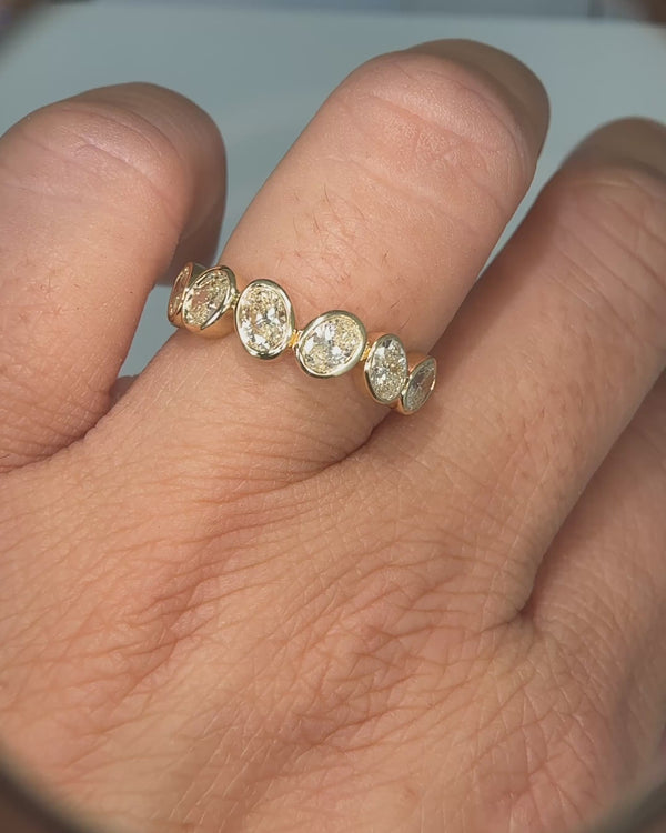 Oval Cut Diamond Bezel Set Half Eternity Band