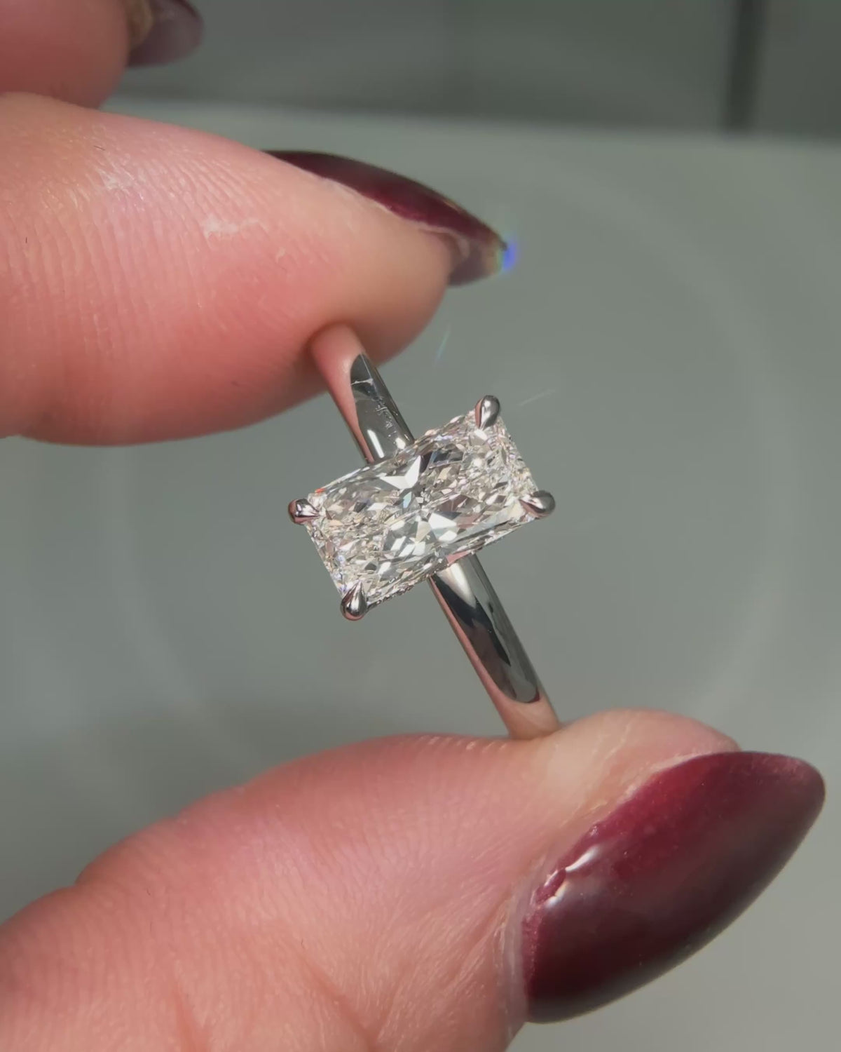 Radiant cut hidden halo diamond engagement ring