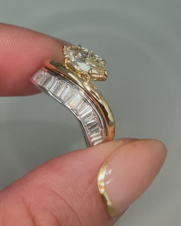 Marquise cut diamond wave baguette ring