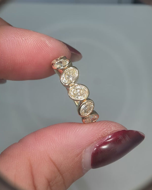 Oval Cut Diamond Bezel Set Half Eternity Band