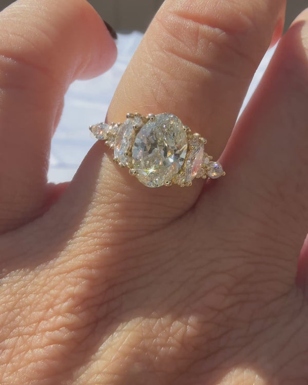 Oval Cut Diamond Esmeralda Ring