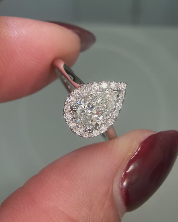 Pear shape halo diamond engagement ring