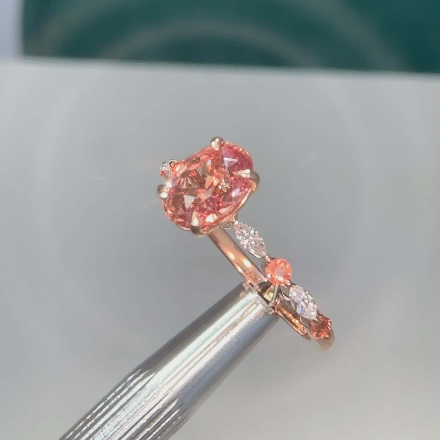 Oval Peach Sapphire and Diamond Ring