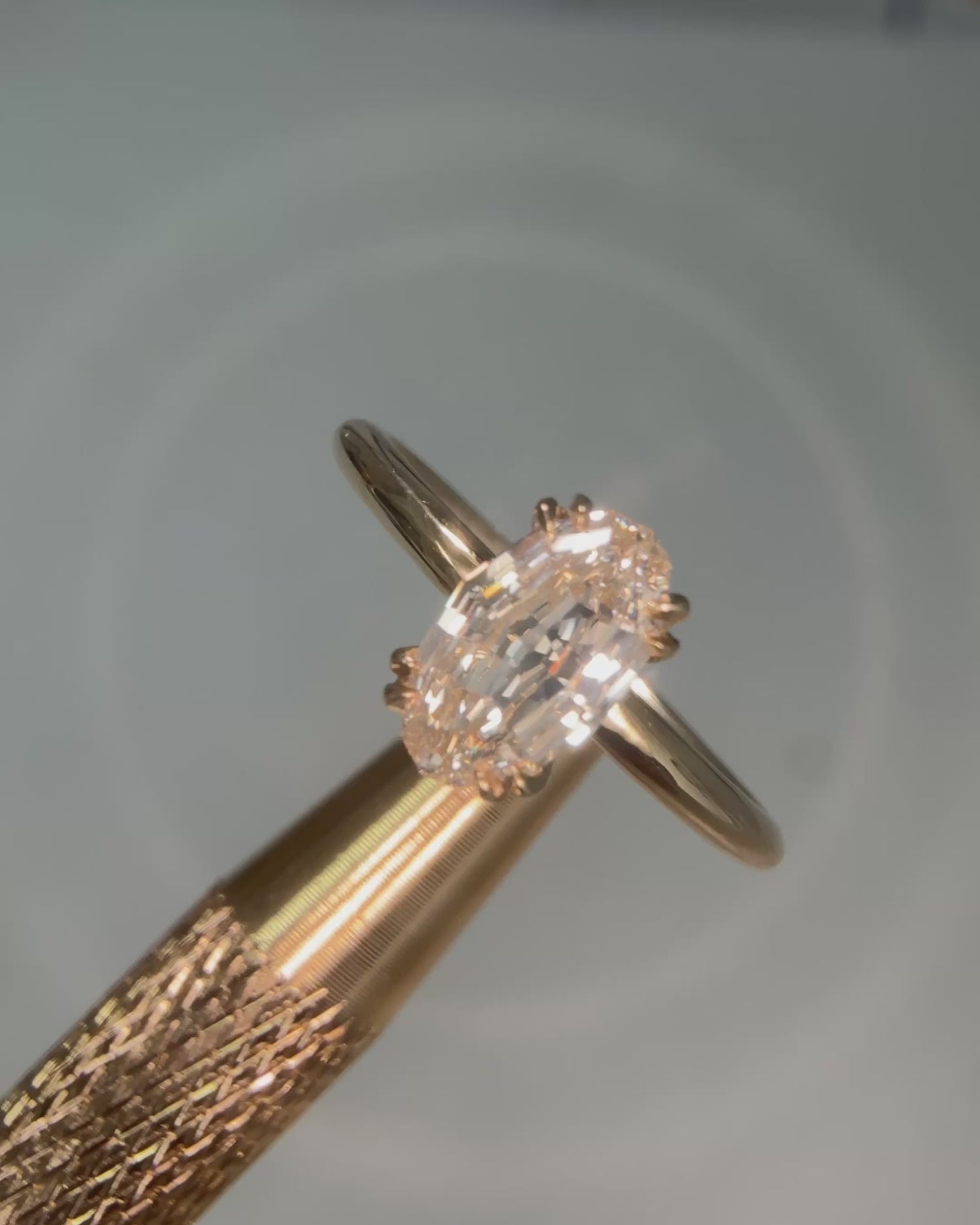 Oval Step Cut Diamond Solitaire Ring