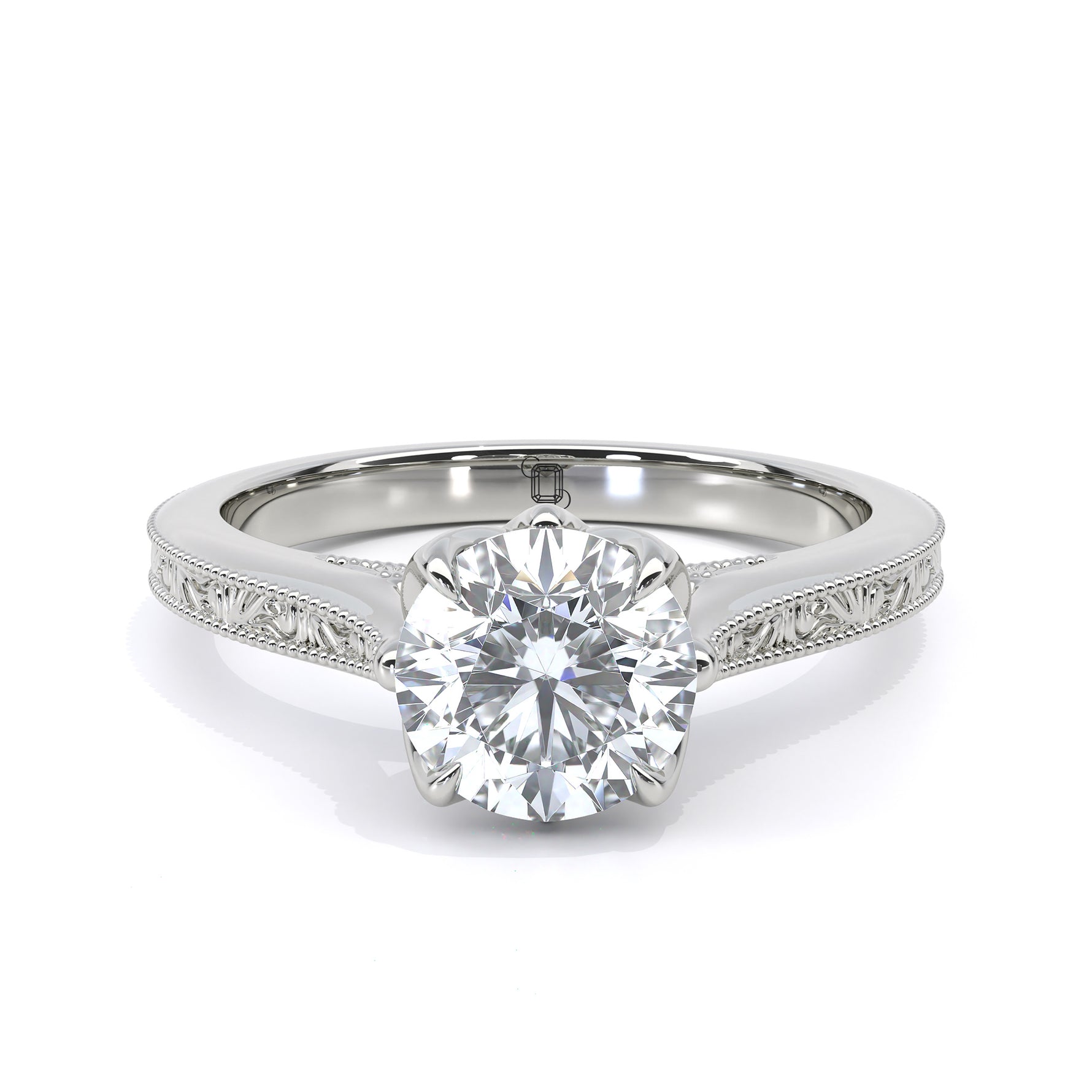 Vintage round diamond engraved engagement ring