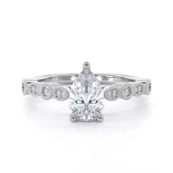 Vintage pear shape diamond engagement ring