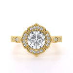 Round brilliant vintage halo diamond engagement ring
